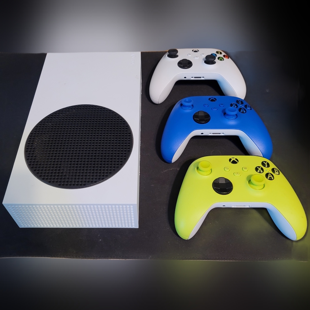 White Xbox Series S Console with Three Controllers